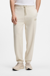 Relaxed-fit trousers in innovative French Terry