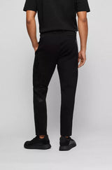 BOSS x AJ Halboa regular-fit tracksuit bottoms with exclusive artwork