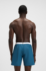 Swim shorts with contrast logo and piping