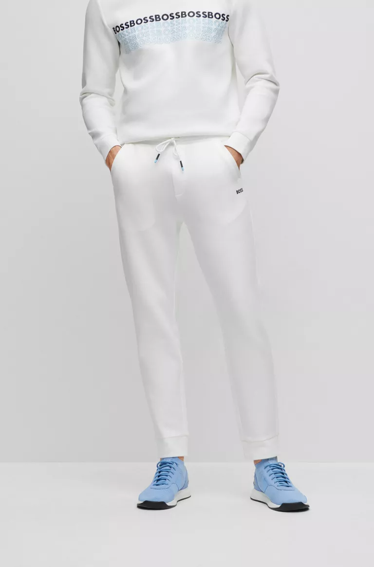 BOSS REGULAR-FIT TRACKSUIT BOTTOMS WITH MULTI-COLOURED LOGOS IN WHITE